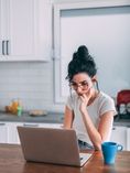 Woman studying laptop