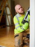 A contractor working on a home repair